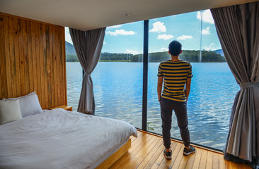 An Asian young man relaxing at resort