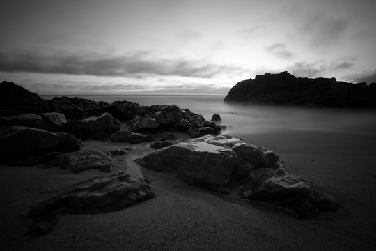 Rocky coast at dusk - Powered by Adobe
