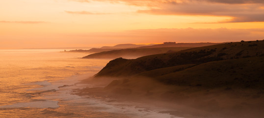 Fototapeta na wymiar Morgan Bay Cliffs at Sunset