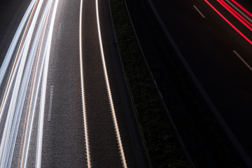 Fototapeta na wymiar light trails at night, highway in germany