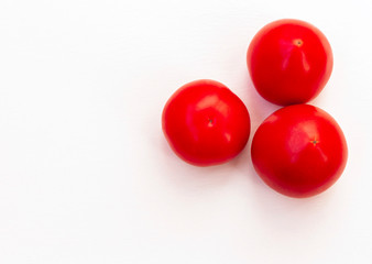 Fresh tomatoes isolated on white background with space for text