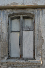 Fototapeta na wymiar Background with old window on stone wall.