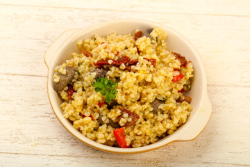 Bulgur with chicken hearts