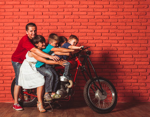 Fototapeta na wymiar The concept of family travel on a motorcycle