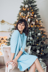 Happy women in Christmas decorations