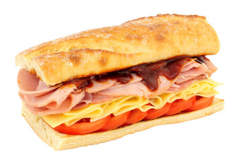 Ham and cheese crusty sandwich with tomatoes isolated on a white background