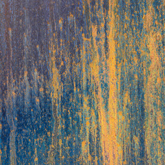 background of metal blue yellow brown rusty plate