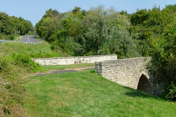 Fototapeta na wymiar Baroque stone bridge