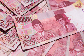 Close up of Indonesian money, 100,000 IDR banknotes 