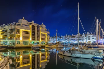 Fotobehang Benalmadena mediterranean port village. Yacht harbor, marina pier and boat, dock yachts and vessels in Benalmadena, Malaga © Alfredo
