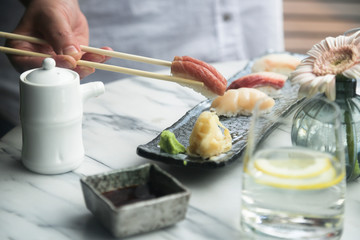 Delicious assorted sushi served outdoors