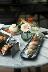 Delicious assorted sushi served outdoors