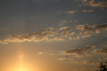 Best clouds and sky color image. The most beautiful abstract sky background. Clouds and pictures of different kinds. Sunset. The sun  rays in the evening.