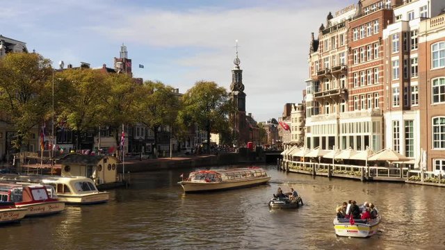Amstel, Halvemaansbrug, Staalkade, monument, Jewish resistance, sloop, boat, boats, water, cityscape, skyline, tourism, travel, urban, old houses, VOC, people, pictures, taking, De L&rsquo;Europe Amsterdam,