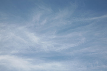 Clouds and sky fluffy and light as air. The beautiful background on the picture of the horizon is painted in blue. The best clouds. 