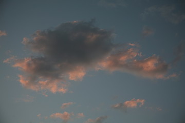 Sky clouds as the best picture. The most abstract background image of the sky. Beautiful sunset. The sun  rays illuminate the clouds.