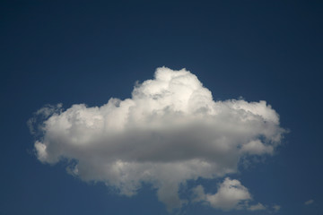 Blue skies like the pictures closed fluffy clouds. Beautiful sky suitable for any natural background. The best sky with clouds stands high in front of us.