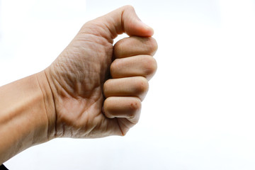 Male clenched fist, isolated on a white background, human hand gesture isolated on white background with copyspace