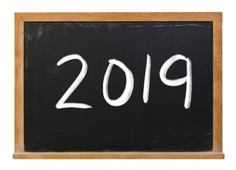 2019 written in white chalk on a black chalkboard isolated on white