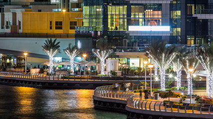 Promenade in Dubai Marina timelapse at night, UAE.