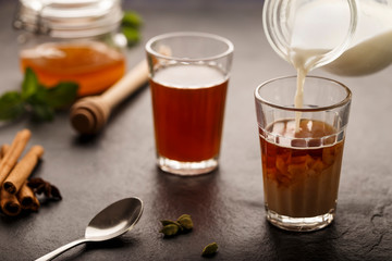 Tea with Milk, Honey and Mint Leaves - Horizontal Image