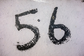 Written Wording in Distressed State Typography Found Number Fifty Six
