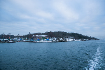 The cruise between the Islands Islands around Oslo Norway during the winter overlooking the sea and the Fjord