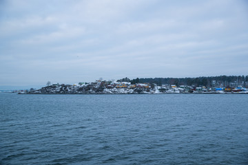 Obraz premium Overlooking the coast of the islands around Oslo Norway over the winter overlooking the sea and the Fjord