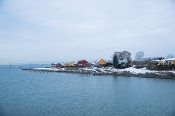Overlooking landscape of the islands around Oslo Norway over the winter overlooking the sea and the Fjord during day