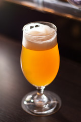 bright glass full of beer