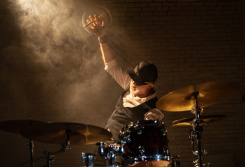 The drummer with the white beard and the power stick