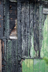 Burned old barn wood background.