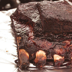 fresh raw meat on fire