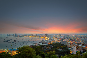 Pattaya City and Sea with suset, Thailand. Pattaya city skyline and pier at sunset in Pattaya...