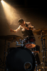 Drummer plays drums
