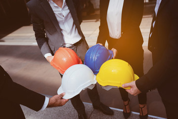Team Asian Construction asian workers are both engineers, businessman and builders are proud to...