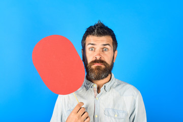 Grieved man with beard&mustache with blank paper. Sorrowful man with empty name card. Sad bearded man holds paper name plate. Feeling&emotions. Face expression. Fashion, hairdressing, barber salon.