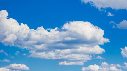 Obraz na płótnie Canvas White clouds in the blue sky.