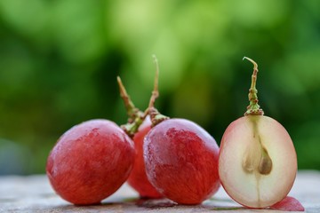 Close-up view of red grape cut in half