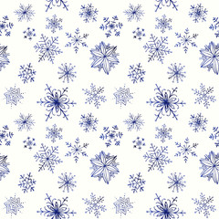 hand drawn seamless pattern of glittering snowflakes