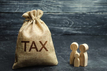 A bag with the word Tax and family. Taxes on real estate, payment. Penalty, arrears. Register of...