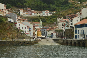 Fototapeta na wymiar Entrance To Cudillero From The Port. July 31, 2015. Travel, Nature, Vacation. Cudillero, Asturias, Spain.