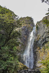 Naklejka na ściany i meble Devil's Punchbowl Waterfall in Arthur's Pass National Park, New Zealand