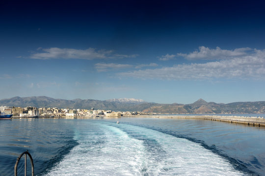 Cruise ship trails in water Crete Greece Europe