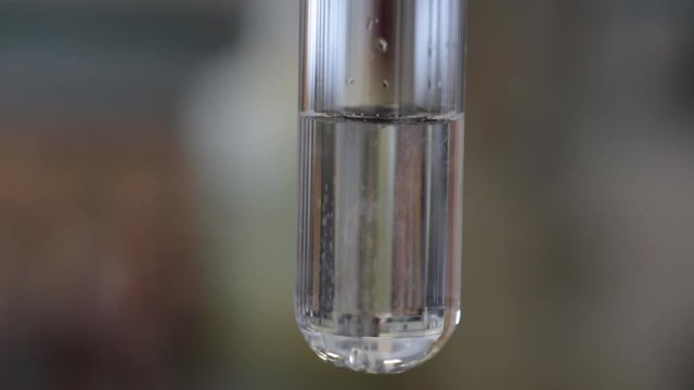 Chemical reaction in a test tube - calcium hydroxide.