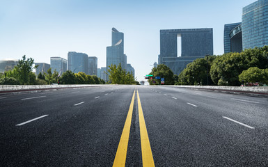 Empty road floor surface with modern city landmark buildings of hangzhou bund Skyline,zhejiang,china