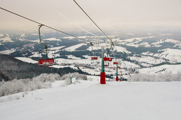 Ski lift ski resort. Winter fun. Family holidays and travel in the mountains. Nature forest landscape