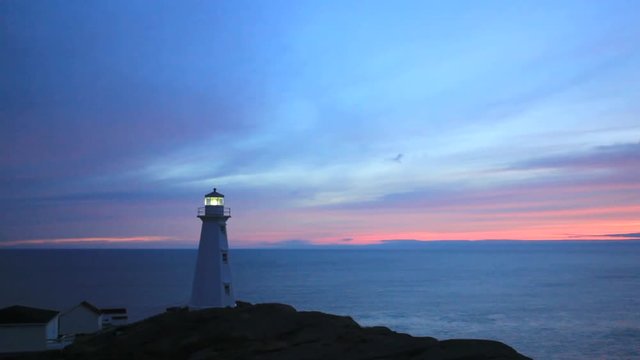 Rugged Newfoundland and Labrador coastline showing the beautiful Cape Spear light tower.