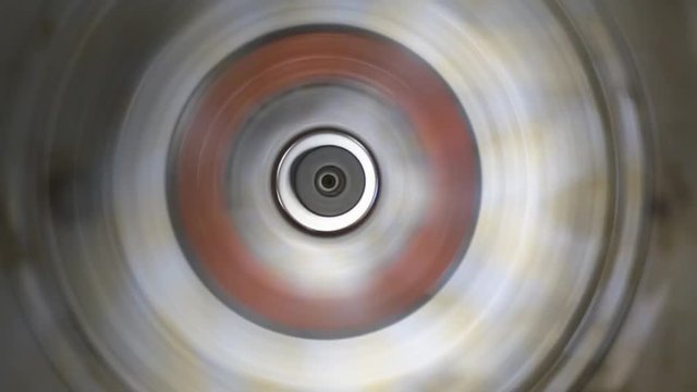 Rotating centrifuge with sample containers.