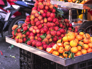 Variety of fresh fruits on a vietnamese market - obrazy, fototapety, plakaty